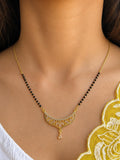 Traditional Filigree Crescent Mangalsutra worn by model - Nyara