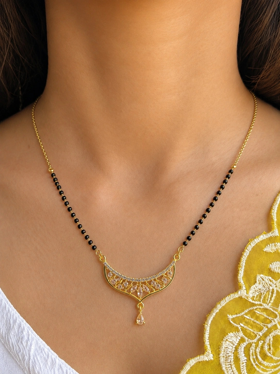 Traditional Filigree Crescent Mangalsutra worn by model - Nyara