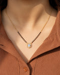 Hexagon Diamond Mangalsutra on jewellery stand - Nyara