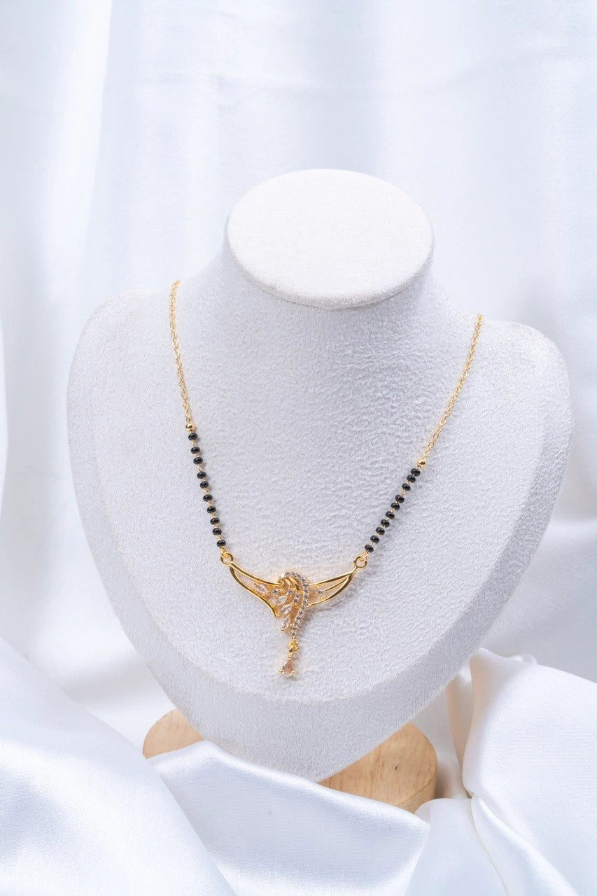 Wing Diamond Mangalsutra on jewellery stand - Nyara