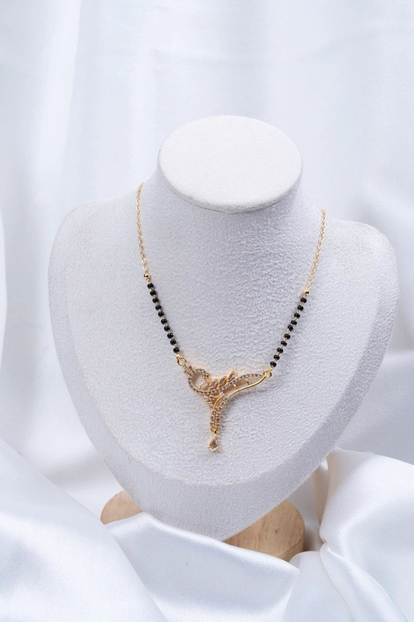 Filigree Vine Diamond Mangalsutra flat lay on peach background - Nyara