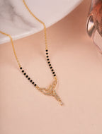 Filigree Vine Diamond Mangalsutra on jewellery stand - Nyara