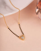 Heart Solitaire CZ Mangalsutra on jewellery stand - Nyara