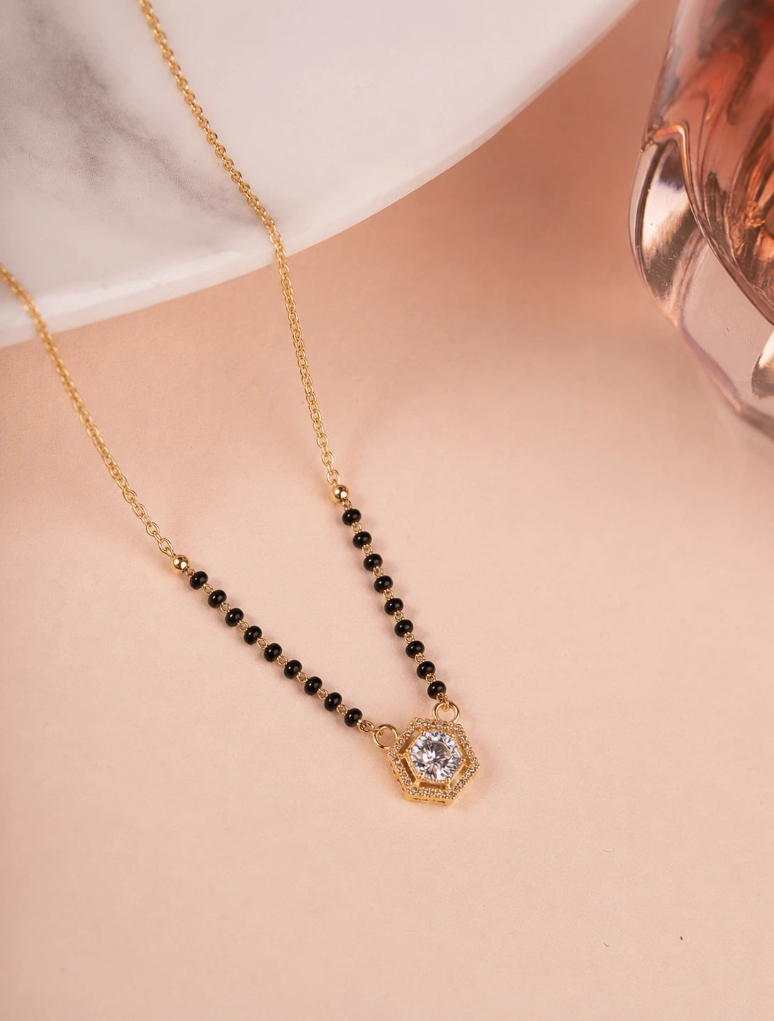Gold Plated Hexagon Mangalsutra flat lay - Nyara