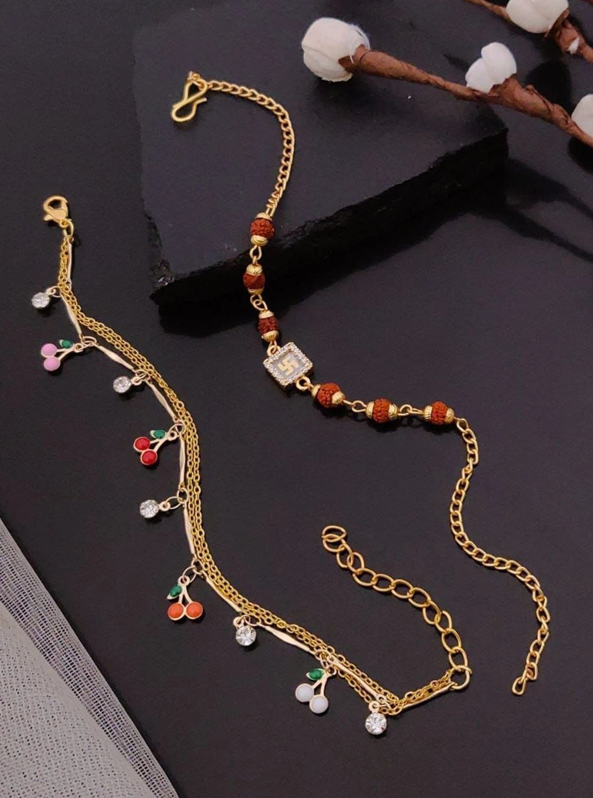 Rudraksha Swastik Rakhi and Cherry Lumba Set